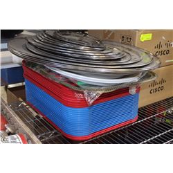 STACK OF SERVING PLATTERS AND FOOD TRAYS