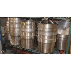 SHELF OF ROUND STAINLESS INSERTS