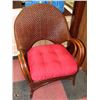 Image 1 : WICKER LOUNGE CHAIR WITH CUSHION.
