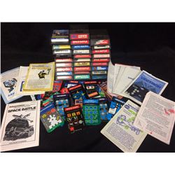 Large Intelevision video game lot with manuals and pads