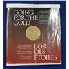 Image 1 : Canada 2002 $1 Going for the Gold Commemorative Coin, Stamp and Magazine Set