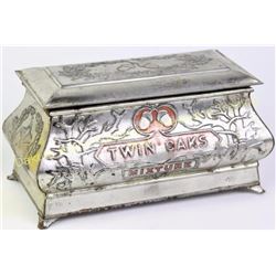 Original Twin Oaks tobacco tin casket humidor in nice original condition, 8 1/2" long.  Est. 50-100