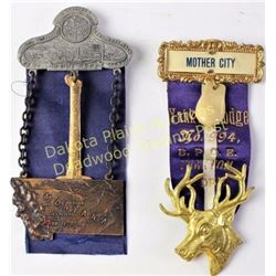 Collection of 2 antique ribbon badges includes Yankton SD Elks 994 with elk ivory and 1911 Butte Mon