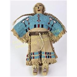 Northern Plains beaded on leather doll 8" tall, sinew sewn with white centered reds, blues and white