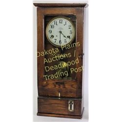 Oak cased Simplex time clock with original finish in good working order at time of description, 31" 