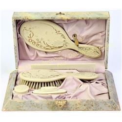 Victorian celluloid dresser box with complete and original accessories, mirror, brush combo, nail bu
