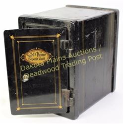 Small antique Wards Home Vault safe, only 9" X 13", all original, nice paint and striping, and key. 