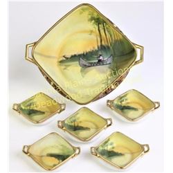 Hand painted Nippon nut set with terrific Indian in canoe pattern. Set includes main bowl and 5 smal