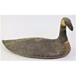 Early canvas goose decoy unmarked 20" long with glass eyes, shows good original condition with no vi
