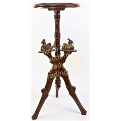 Carved mahogany Victorian fern stand with bird motif, 33" tall.  Est. 175-275
