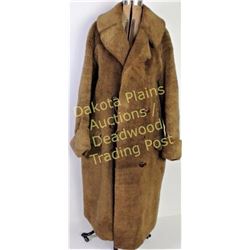 Sheared lambs wool mens long coat, inner tag reads "Polar Coats Minneapolis Genuine Laskin Lamb. Ver