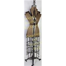 Antique dress makers form on cast iron base and wheels.  Est. 100-175