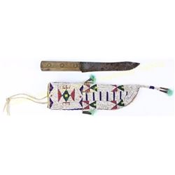 Large Sioux beaded knife sheath sinew sewn with white centered reds, green, metal faceteds, greasy y