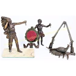 Collection of 3 pocket watch stands all cast metal including Indian Chief, small boy and shotguns ov