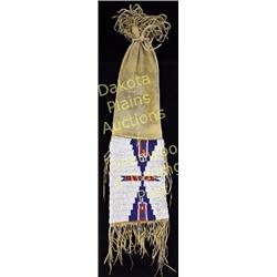 1890-1900 Northern Plains beaded pipe bag 27" long including fringe, beadwork panels 8 1/2" tall in 