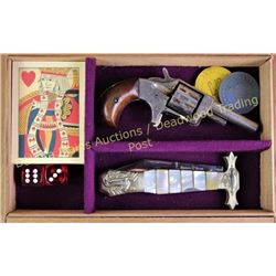 Cased gamblers set in Deadwood Tobacco Co cigar box, with antique Defender spur trigger scarlett gun