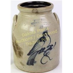 New York stoneware 2 gallon jar with elephant ear molded handles, blue bird to front, shows old hair