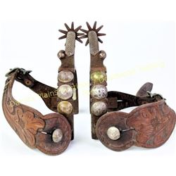 EG* Edwardo Grijalva stamped spurs single mounted with unmarked 2 piece straps.  Est. 250-400