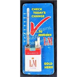 L&M tin advertising thermometer in working order, 6" X 13".  Est. 50-125