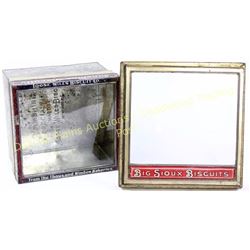 Collection of 2 includes Sunshine Biscuit tin box with window lid and Big Sioux Biscuits window lid.