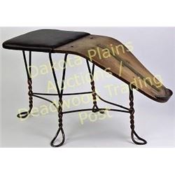 Early boot or shoe store foot stand with brass measurement strip and padded seat.  Est. 100-200