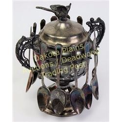Victorian sugar spooner complete with bird finial in sterling plate, 9" tall.  Est. 75-175