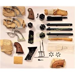 Collection of new old stock Colt parts includes 3 aluminum Scout .22 back stamps, 2 pair Scout walnu