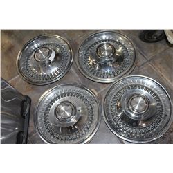 FOUR VINTAGE METAL HUBCAPS