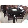 Image 1 : ROZZINI TABLE WITH GLASS INSERT AND SIX LEATHER CHAIRS