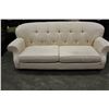 Image 1 : WHITE BUTTONBACK DESIGNER SOFA