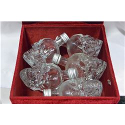 RED VELVET BOX WITH FIVE GLASS SKULL BOXES