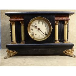 Black mantle clock, made USA, 4 columns