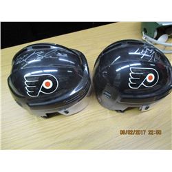 Two Miniture Autographed Black Flyers Helmets