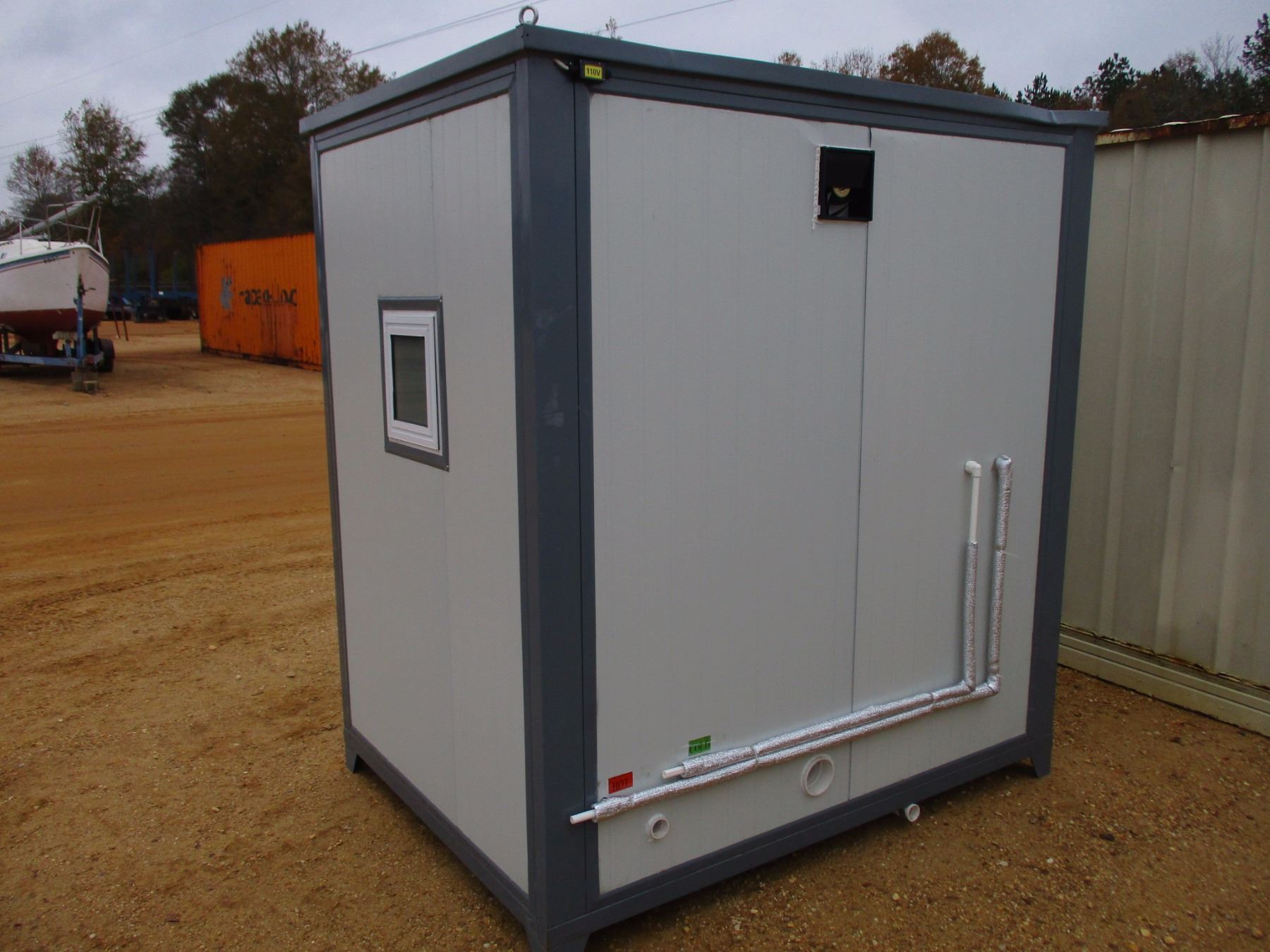 PORTABLE RESTROOM, 5' X 7' METAL, SHOWER, TOILET, SINK, MIRROR (UNUSED)