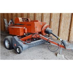 Hesston Agco 7115 in-line square baler, makes a 14’x18” bale