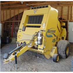 Vermeer 604 Super M round baler,  makes a 4 ft.-wide bale