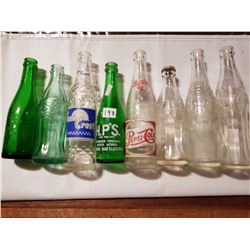 Lot of 8 pop bottles lot #1
