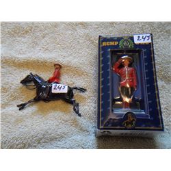 Two lead RCMP figurines