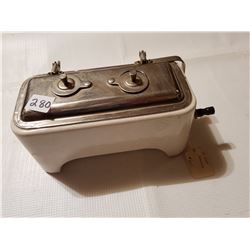 Antique sterilizer tool