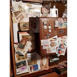 Antique wood box with old religious items inside