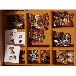 Jewelry box full of earrings