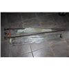 Image 1 : FOUR NEW EXTENTION AWNING POLES AND THREE FIVE FOOT BAR CLAMPS