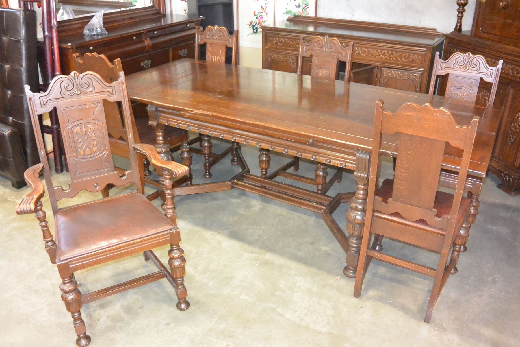 ANTIQUE KRUG DRAW LEAF TABLE AND SIX CHAIRS