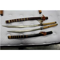 TWO DECORATIVE SWORDS