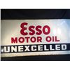 Image 1 : LARGE VINTAGE ESSO MOTOR OIL "UNEXCELLED" ADVERTISING SIGN, MARKED A-3155-39 ON BOTTOM RIGHT, 6'