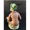 Image 2 : HAND CRAFTED AND PAINTED CERAMIC FIGURINE, OF AN OLD MAN SMOKING A PIPE WITH A FISH, 6.5'' TALL