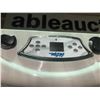 Image 3 : CAL SPAS 7' X 7' HOT TUB WITH STERLING SILVER INTERIOR AND SMOKE EXTERIOR. TUB FEATURES: