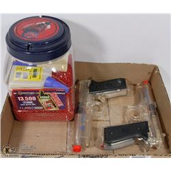 PAIR OF TAURUS SOFT AIR GUNS W/ LARGE BOX OF BB'S