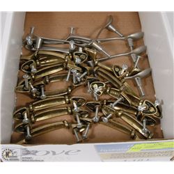 15 BRASS CABINET PULLS AND 5 SILVER SPOONS