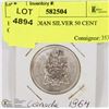 Image 1 : 1964 CANADIAN SILVER 50 CENT COIN.